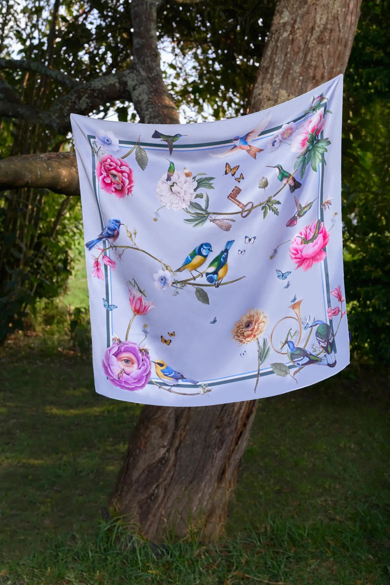 Luxury fashion with bold sublimation prints on silk satin polyester, designed to make a statement.